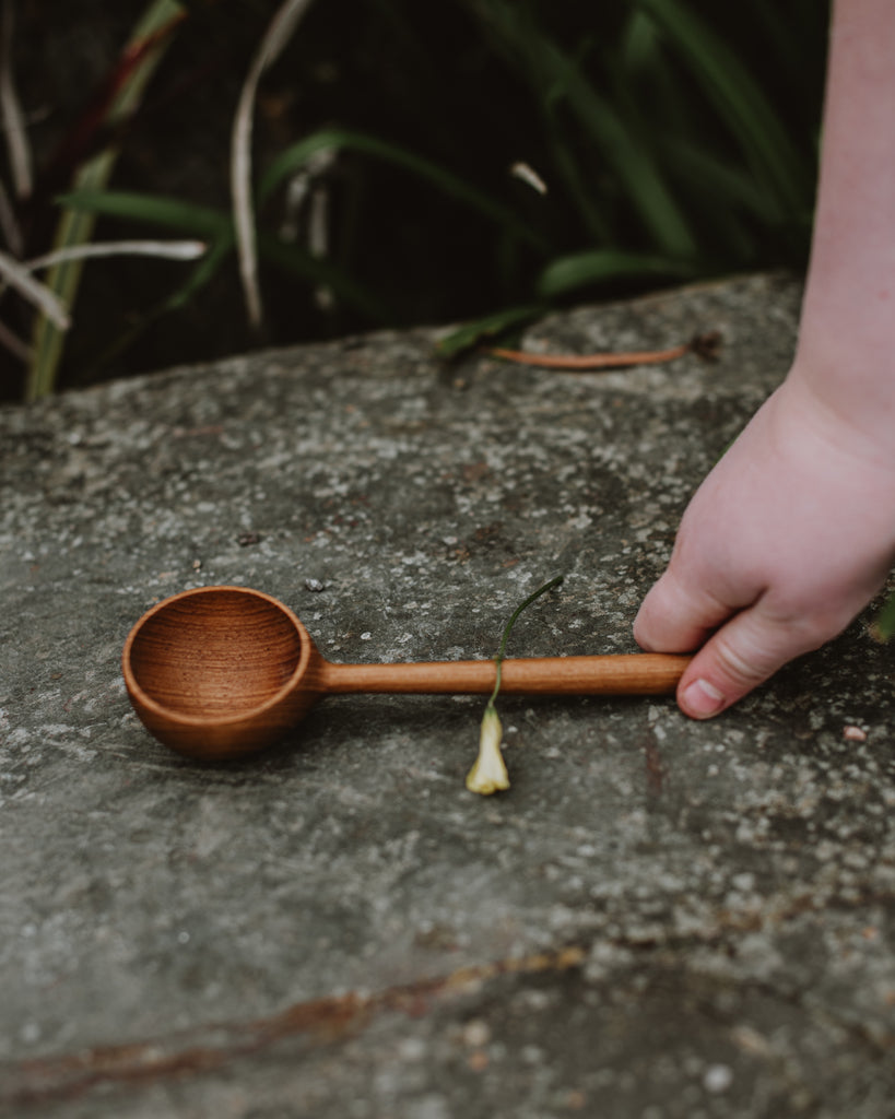 Wooden Scoop Full moon Spoon with child's hand